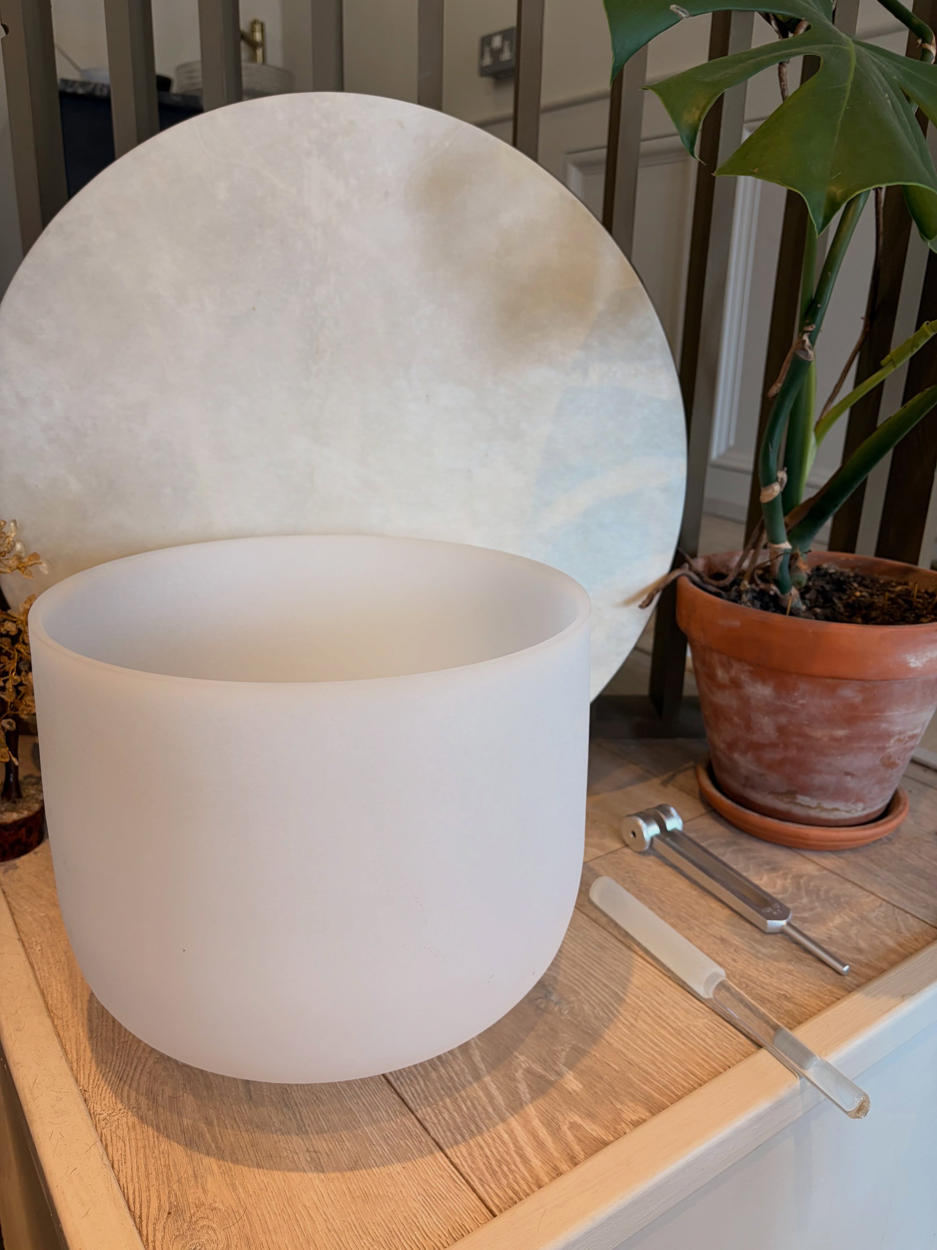 Crystal sound bowl used in holistic rituals at Meraki
